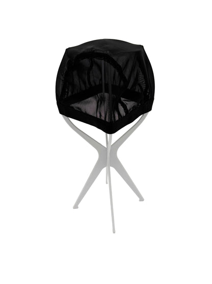 Black geometric chair with a white base on a white background