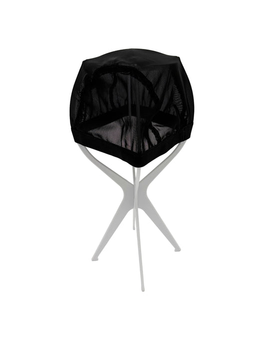 Black geometric chair with a white base on a white background