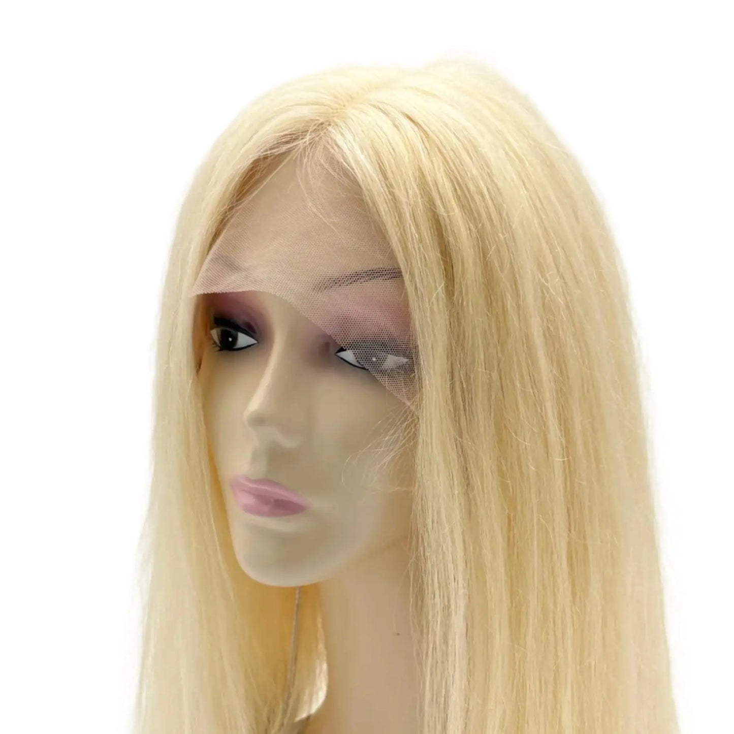 Blonde wig on a mannequin head against a white background