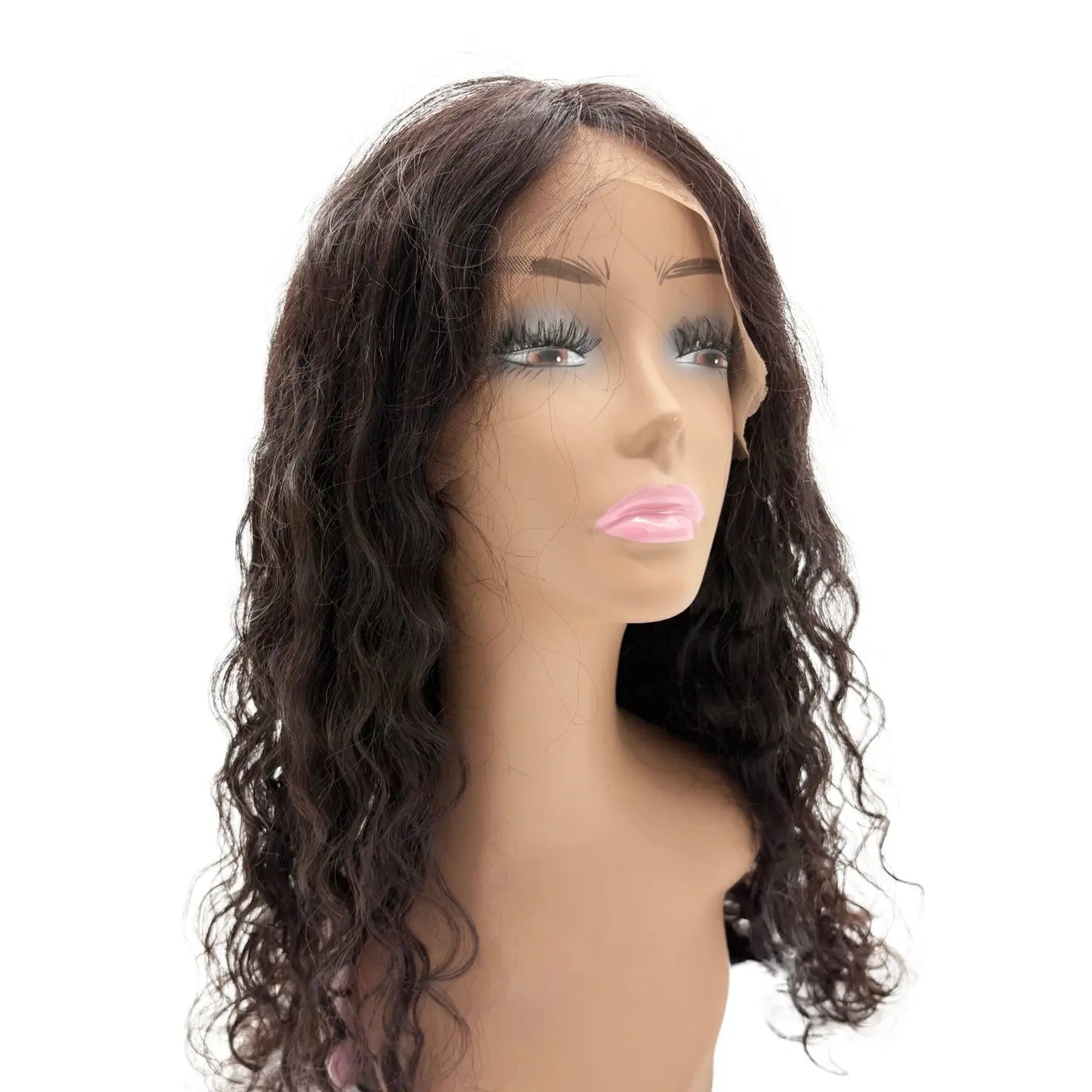 Mannequin head with a brown wavy wig on a white background