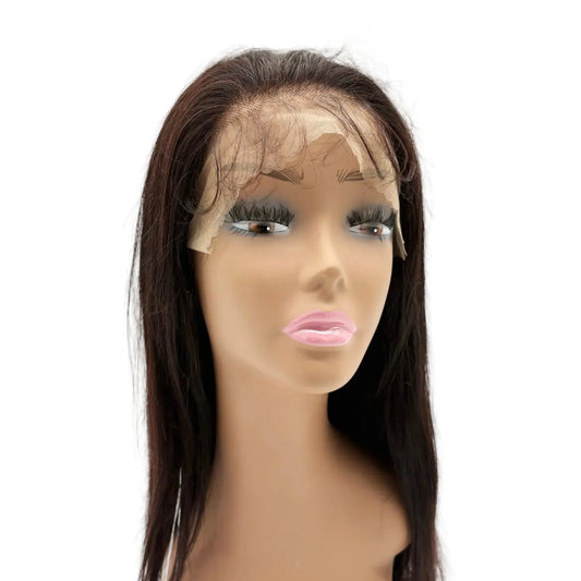 Mannequin head with a dark brown wig on a white background