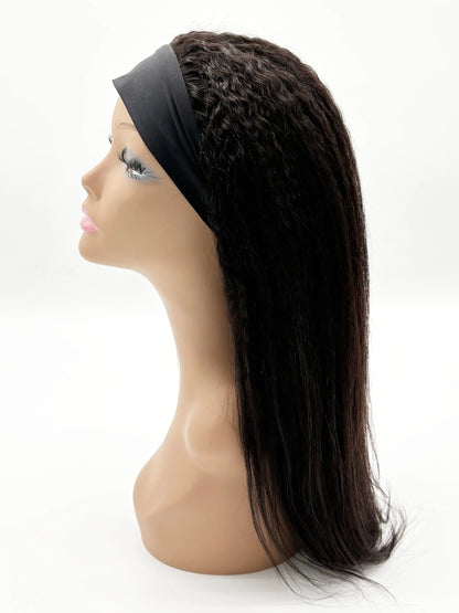 Mannequin head with a black wig on a white background