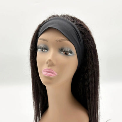 Mannequin head with dark brown hair and a gray headband on a white background