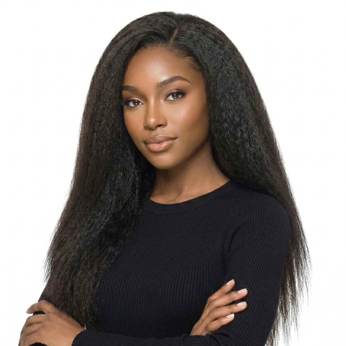 Woman with long, straight hair wearing a black top on a white background
